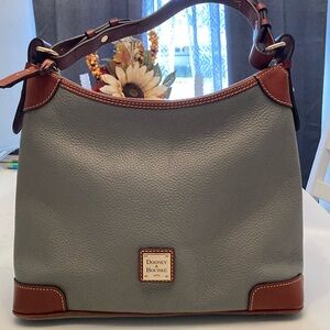 Excellent condition Dooney & Bourke Pebble Grain Hobo bag in smokey gray.